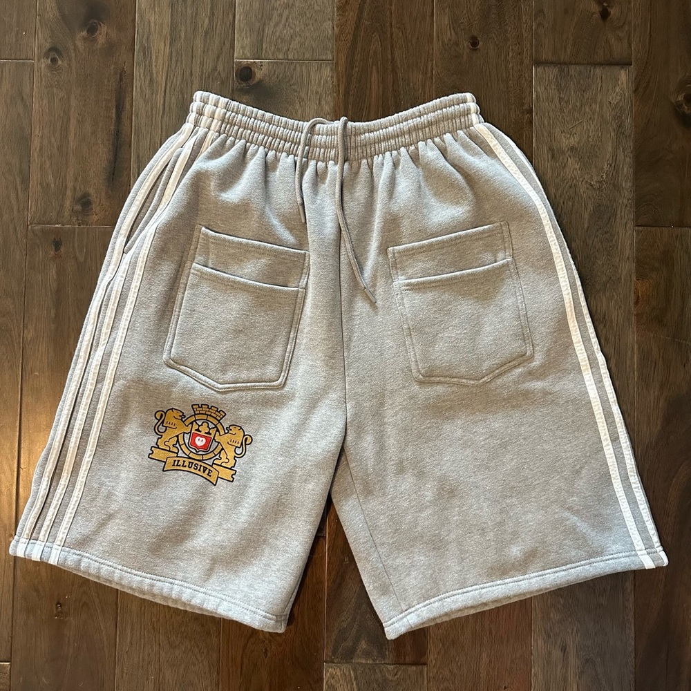 Stylish Gray Athletic Shorts with Crest